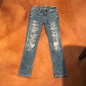 Acid wash distressed skinny jeans